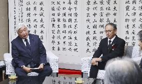 Okinawa governor meets defense minister