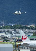 Airplanes taking off and landing at Itami Airport (Osaka International Airport)