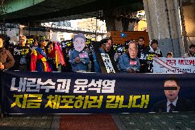 Citizens March To Presidential Residence Holding A Self-Issued Emergency Arrest Warrant