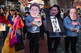 Citizens March To Presidential Residence Holding A Self-Issued Emergency Arrest Warrant