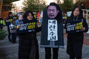 Citizens March To Presidential Residence Holding A Self-Issued Emergency Arrest Warrant