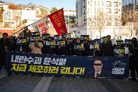 Citizens March To Presidential Residence Holding A Self-Issued Emergency Arrest Warrant