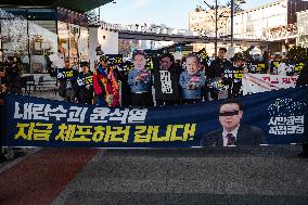 Citizens March To Presidential Residence Holding A Self-Issued Emergency Arrest Warrant