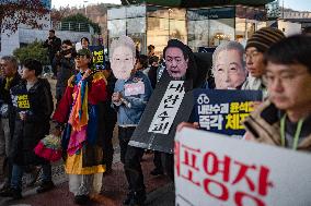 Citizens March To Presidential Residence Holding A Self-Issued Emergency Arrest Warrant