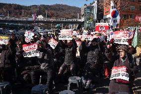 Citizens March To Presidential Residence Holding A Self-Issued Emergency Arrest Warrant