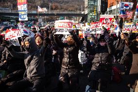 Citizens March To Presidential Residence Holding A Self-Issued Emergency Arrest Warrant