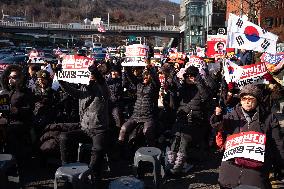 Citizens March To Presidential Residence Holding A Self-Issued Emergency Arrest Warrant