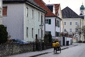 Deutsche Post Letter Carrier On A Bicycle