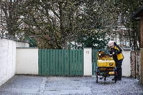 Deutsche Post Letter Carrier On A Bicycle