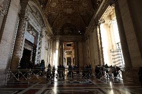 Pilgrims pass through the Holy Door