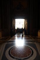 Pilgrims pass through the Holy Door