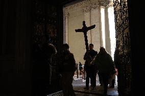 Pilgrims pass through the Holy Door