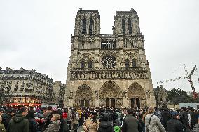 Large Crowd At Notre-Dame De Paris For First Christmas Masses