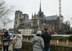 Large Crowd At Notre-Dame De Paris For First Christmas Masses