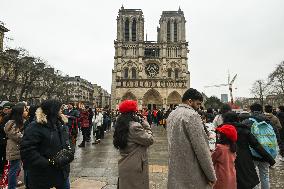 Large Crowd At Notre-Dame De Paris For First Christmas Masses