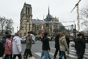 Large Crowd At Notre-Dame De Paris For First Christmas Masses