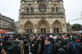 Large Crowd At Notre-Dame De Paris For First Christmas Masses