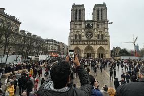 Large Crowd At Notre-Dame De Paris For First Christmas Masses