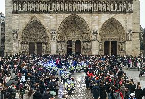 Large Crowd At Notre-Dame De Paris For First Christmas Masses