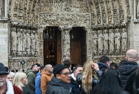 Large Crowd At Notre-Dame De Paris For First Christmas Masses