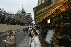 Large Crowd At Notre-Dame De Paris For First Christmas Masses