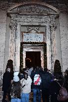 Pilgrims Walk Through The Holy Door Of St. Peter's Basilica - Vatican