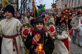 Ukrainians Sing Christmas Carols And Carry Decorated Stars Of Bethlehem As They Mark Christmas In Downtown Kyiv