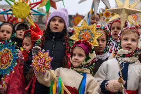 Ukrainians Sing Christmas Carols And Carry Decorated Stars Of Bethlehem As They Mark Christmas In Downtown Kyiv