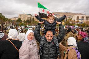 Syrians Celebrate The Overthrow Of The Assad Regime In Umayyad Square, Damascus