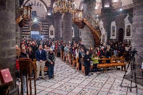 Syrian Christians Celebrate Christmas Eve At Olive Church - Damascus