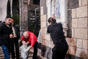 Syrian Christians Celebrate Christmas Eve At Olive Church - Damascus