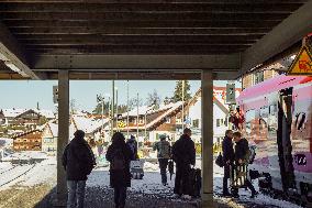 Passengers On A Platform Of Bavarian Train Station Oberstaufen