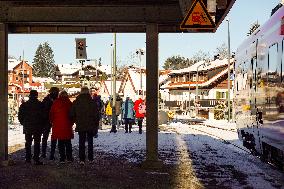 Passengers On A Platform Of Bavarian Train Station Oberstaufen