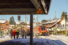 Passengers On A Platform Of Bavarian Train Station Oberstaufen