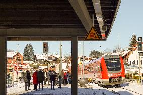 Passengers On A Platform Of Bavarian Train Station Oberstaufen