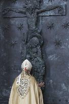 Cardinal Baldassare Reina opens the Holy Door of Rome's St. John - Vatican