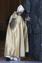 Cardinal Baldassare Reina opens the Holy Door of Rome's St. John - Vatican