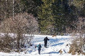 Winter Walkers In The Bavarian Municipality Kruen