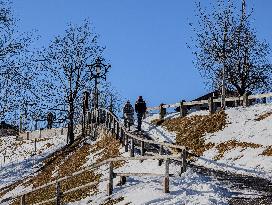 Winter Walkers In The Bavarian Municipality Kruen