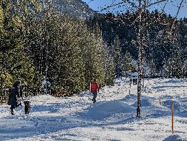 Winter Walkers In The Bavarian Municipality Kruen