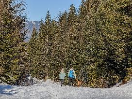 Winter Walkers In The Bavarian Municipality Kruen