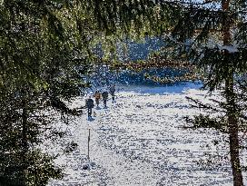 Winter Walkers In The Bavarian Municipality Kruen