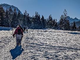 Winter Walkers In The Bavarian Municipality Kruen