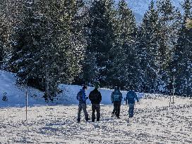 Winter Walkers In The Bavarian Municipality Kruen