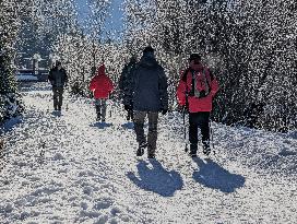 Winter Walkers In The Bavarian Municipality Kruen