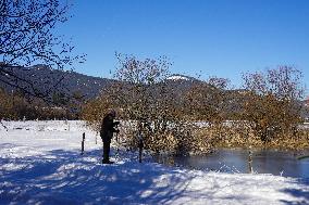 Winter Walkers In The Bavarian Municipality Kruen