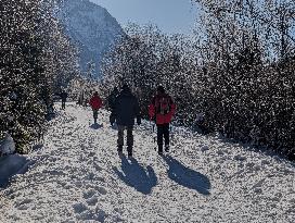 Winter Walkers In The Bavarian Municipality Kruen