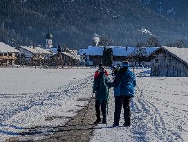 Winter Walkers In The Bavarian Municipality Kruen