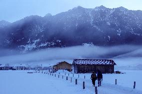 Winter Walkers In The Bavarian Municipality Kruen