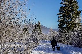 Winter Walkers In The Bavarian Municipality Kruen